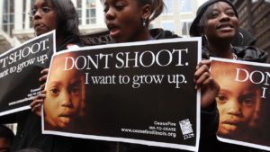 Don't Shoot protest poster