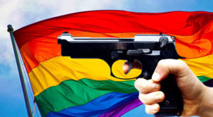 Gun in front of rainbow flag